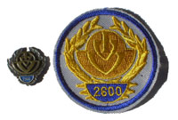 Picture of the pin and patch for 2,600 Events