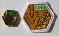 Picture of the pin and patch for 1,200 Events